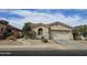 Beautiful single-story home with desert landscaping and a convenient two-car garage at 14380 W Monte Vista Rd, Goodyear, AZ 85395