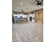 Open kitchen featuring granite countertops, white cabinets, stainless steel appliances, and a large island at 14380 W Monte Vista Rd, Goodyear, AZ 85395