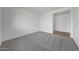Neutral bedroom with neutral carpet and ample natural light at 14789 W Lariat Ln, Surprise, AZ 85387