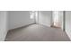 Clean bedroom featuring neutral carpet, one window, and a closet at 14789 W Lariat Ln, Surprise, AZ 85387