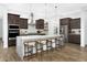 Stunning kitchen boasts a spacious island, stainless steel appliances, and modern finishes at 14789 W Lariat Ln, Surprise, AZ 85387