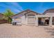 Spacious backyard with low-maintenance landscaping and covered patio, great for outdoor living at 1520 N Milly Pl, Casa Grande, AZ 85122