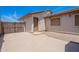 Side of home showing fenced yard and gated entrance at 1520 N Milly Pl, Casa Grande, AZ 85122