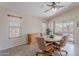 Breakfast nook features a dining table, patio access and outdoor views at 1520 N Milly Pl, Casa Grande, AZ 85122