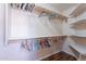 Walk-in closet with ample shelving and hanging space for organized storage at 1520 N Milly Pl, Casa Grande, AZ 85122