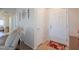 Bright entryway with a white front door, decorated walls, and a tile floor at 1520 N Milly Pl, Casa Grande, AZ 85122