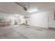 Uncluttered garage showcasing open space with plenty of room for storage and workbench at 1520 N Milly Pl, Casa Grande, AZ 85122