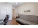 Cozy office featuring a futon, desk, and plenty of natural lighting at 1520 N Milly Pl, Casa Grande, AZ 85122