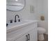 Bathroom features sleek black hardware and a modern white vanity with plenty of counter space at 15421 S 16Th Dr, Phoenix, AZ 85045