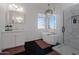Bright bathroom featuring a soaking tub, glass shower, and vanity with dual sinks at 15421 S 16Th Dr, Phoenix, AZ 85045