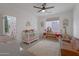 Bright bedroom with a crib and lots of room for play at 15421 S 16Th Dr, Phoenix, AZ 85045