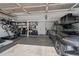 Spacious garage with shelving and a car at 15421 S 16Th Dr, Phoenix, AZ 85045