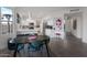 Modern kitchen with stainless steel appliances, eat-in dining area, and plenty of cabinet space for storage at 15421 S 16Th Dr, Phoenix, AZ 85045