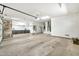 Well-lit, spacious garage with ample storage, a utility sink, and room for multiple vehicles at 15534 W Big Sky Dr, Surprise, AZ 85374