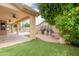 Backyard features a covered patio, a grill, and a fire pit at 1555 E Monterey St, Chandler, AZ 85225