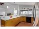 Bright kitchen boasts white countertops and modern appliances and fixtures at 161 S Maple St, Chandler, AZ 85226