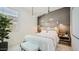Bright bedroom with unique lighting and décor at 17345 W Smoketree Dr, Surprise, AZ 85387
