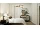A bright bedroom, with a light fixture and wooden furnishings creating an inviting, stylish atmosphere at 17349 W Smoketree Dr, Surprise, AZ 85387