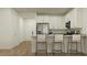 Clean, bright kitchen with a breakfast bar and modern appliances; open and inviting at 17349 W Smoketree Dr, Surprise, AZ 85387