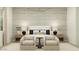 Inviting bedroom with decorative pillows, lamps and textured wallpaper at 17403 W Swayback Pass, Surprise, AZ 85387