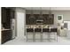 Gourmet kitchen with dark cabinets, stainless steel appliances, and a large island at 17403 W Swayback Pass, Surprise, AZ 85387