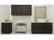 Functional laundry room with dark cabinets, white countertops, and a laundry sorting cart at 17403 W Swayback Pass, Surprise, AZ 85387