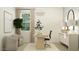 Stylish home office with a modern desk, comfortable seating, and a well-lit workspace at 17403 W Swayback Pass, Surprise, AZ 85387