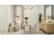 Home office with neutral tones, modern furnishings, stylish lighting, and a calming ambiance at 17411 W Swayback Pass, Surprise, AZ 85387