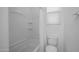 Clean bathroom with a bathtub and shower combination, plus modern fixtures and hardware at 18135 W Hope Dr, Goodyear, AZ 85338