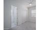 Bright bedroom features an en suite bathroom and a closet, providing a convenient and private retreat at 18135 W Hope Dr, Goodyear, AZ 85338