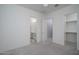 Bright bedroom showing ensuite bathroom and walk-in closet at 18135 W Hope Dr, Goodyear, AZ 85338