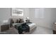 Comfortable bedroom with neutral tones, stylish bedding, and matching nightstands at 18135 W Hope Dr, Goodyear, AZ 85338