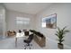 Bright office space with modern desk, decor, large window, and stylish accents at 18135 W Hope Dr, Goodyear, AZ 85338