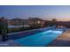 Backyard pool with mountain and lake views at 18135 W Hope Dr, Goodyear, AZ 85338