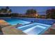 Captivating pool with elegant tile work and a soothing spa at 18135 W Hope Dr, Goodyear, AZ 85338