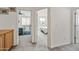 Hallway view showcasing access to bedrooms with inviting interior design at 19242 W Pasadena Ave, Litchfield Park, AZ 85340