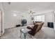 Loft featuring a comfy leather sofa and a ceiling fan at 19242 W Pasadena Ave, Litchfield Park, AZ 85340