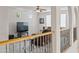 Upstairs loft providing additional living space and plenty of natural light at 19242 W Pasadena Ave, Litchfield Park, AZ 85340