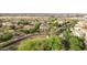 Residential neighborhood with single-Gathering homes, green landscaping, and a community park at 20412 W Thayer St, Buckeye, AZ 85396