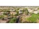 Residential neighborhood with single-Gathering homes, mature trees, and well-maintained streets and landscaping at 20412 W Thayer St, Buckeye, AZ 85396