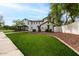Spacious home with manicured backyard and solar panels, perfect for comfortable outdoor living at 20412 W Thayer St, Buckeye, AZ 85396