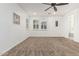 Neutral bedroom with ceiling fan, recessed lighting and small window at 20412 W Thayer St, Buckeye, AZ 85396