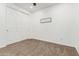 Neutral bedroom featuring sliding door closet and cozy carpeting at 20412 W Thayer St, Buckeye, AZ 85396