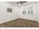 Bedroom with wreath wall decor and plantation shutters at 20412 W Thayer St, Buckeye, AZ 85396