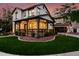 Attractive two-story home with covered front porch and well-maintained landscaping at 20412 W Thayer St, Buckeye, AZ 85396