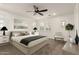 Bright main bedroom with ceiling fan and plenty of natural light at 20412 W Thayer St, Buckeye, AZ 85396