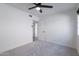 Bright bedroom with neutral colored carpet flooring at 2309 W Naranja Ave, Mesa, AZ 85202
