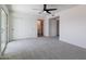 Spacious bedroom with closet and neutral carpet flooring at 2309 W Naranja Ave, Mesa, AZ 85202