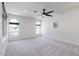 Primary bedroom with neutral carpet flooring and light colored walls at 2309 W Naranja Ave, Mesa, AZ 85202