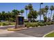 Dobson Ranch Golf Course entrance sign surrounded by mature landscaping at 2309 W Naranja Ave, Mesa, AZ 85202